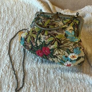 Original purse with beaded work throughout and should strap and handles.